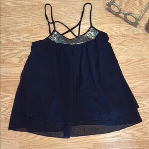 Elegant Black Sleeveless Top with Gold Sequin Accent